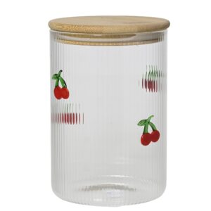Barattolo in vetro con frutti di bosco